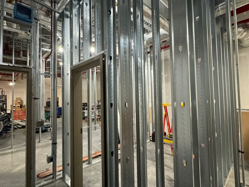 Metal stud framing with door opening in commercial building by JN Contractor LLC