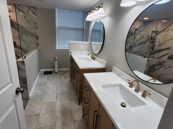 Bathroom remodel with tile floor and double vanity in Nashville TN